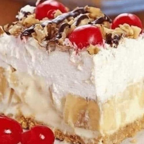 No-Bake Banana Split Dessert - Indulge in the delightful layers of graham cracker crust, creamy filling, fresh fruits, and nuts. A quick and easy no-bake treat for your sweet cravings!
